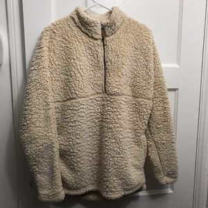 Very warm sweater warm Inside too very fluffy